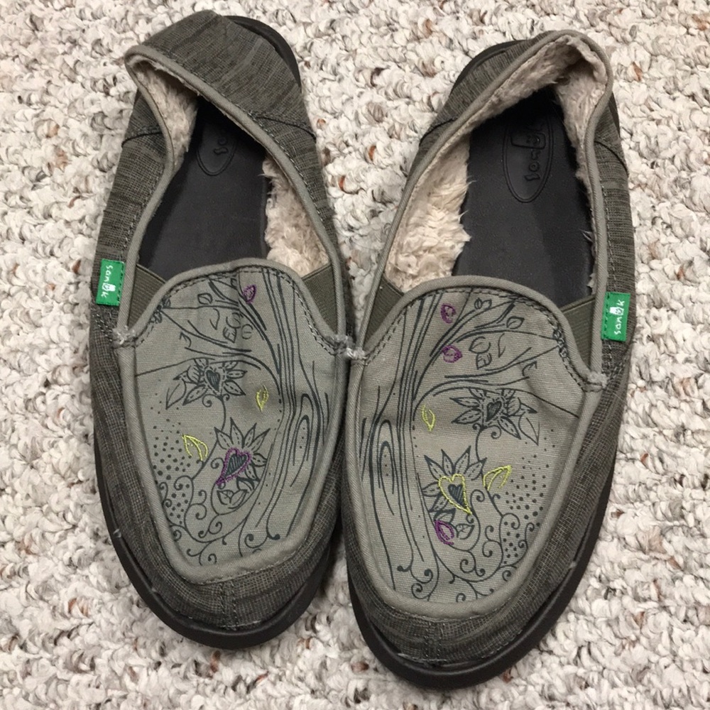 Barely worn fur-lined SANUK slip ons